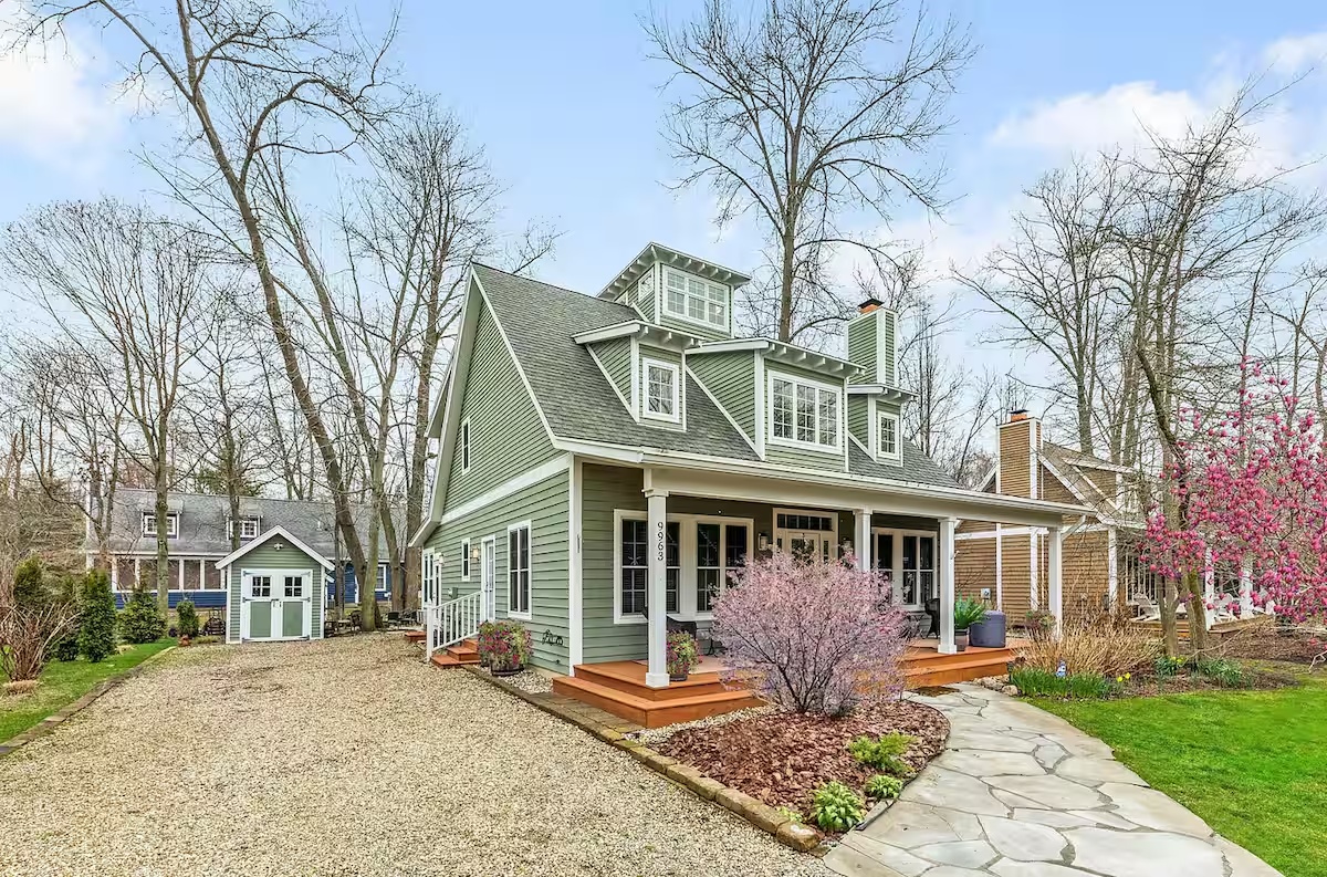 Green cottage exterior of Modern Cozy Home